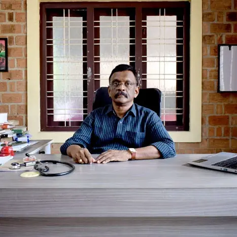 Portrait of Dr. K.R. Krishnakumar, Senior Homeopathic Physician